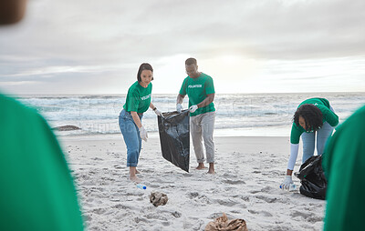 Buy stock photo Teamwork, charity and recycling with people on beach for sustainability, environment and eco friendly. Climate change, earth day and nature with volunteer and plastic for help, energy and pollution