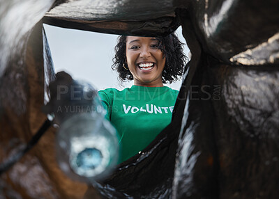 Buy stock photo Recycle, smile and woman with view in bag, sustainability and cleaning plastic pollution for earth day and community service. Saving the environment, charity and people putting trash in garbage.