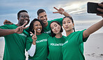 Peace sign, selfie and volunteer with people on beach for sustainability, environment or climate change. Diversity, earth day and social media with friends and phone for technology, energy or charity