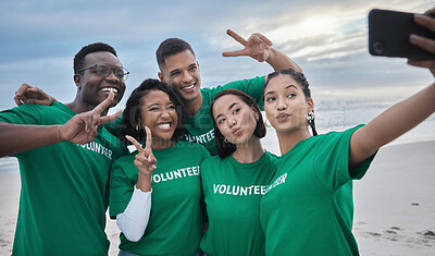 Buy stock photo Peace sign, selfie and volunteer with people on beach for sustainability, environment or climate change. Diversity, earth day and social media with friends and phone for technology, energy or charity