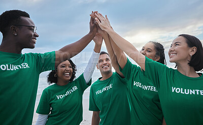 Buy stock photo Teamwork, high five and volunteer with people on beach for sustainability, environment and climate change. Charity, earth day and community with friends for support, diversity and pollution awareness