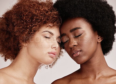 Buy stock photo Skincare, beauty and black women with eyes closed and afro, friends isolated on grey background. Dermatology, diversity and face, luxury cosmetics or makeup, woman model and friend in studio together