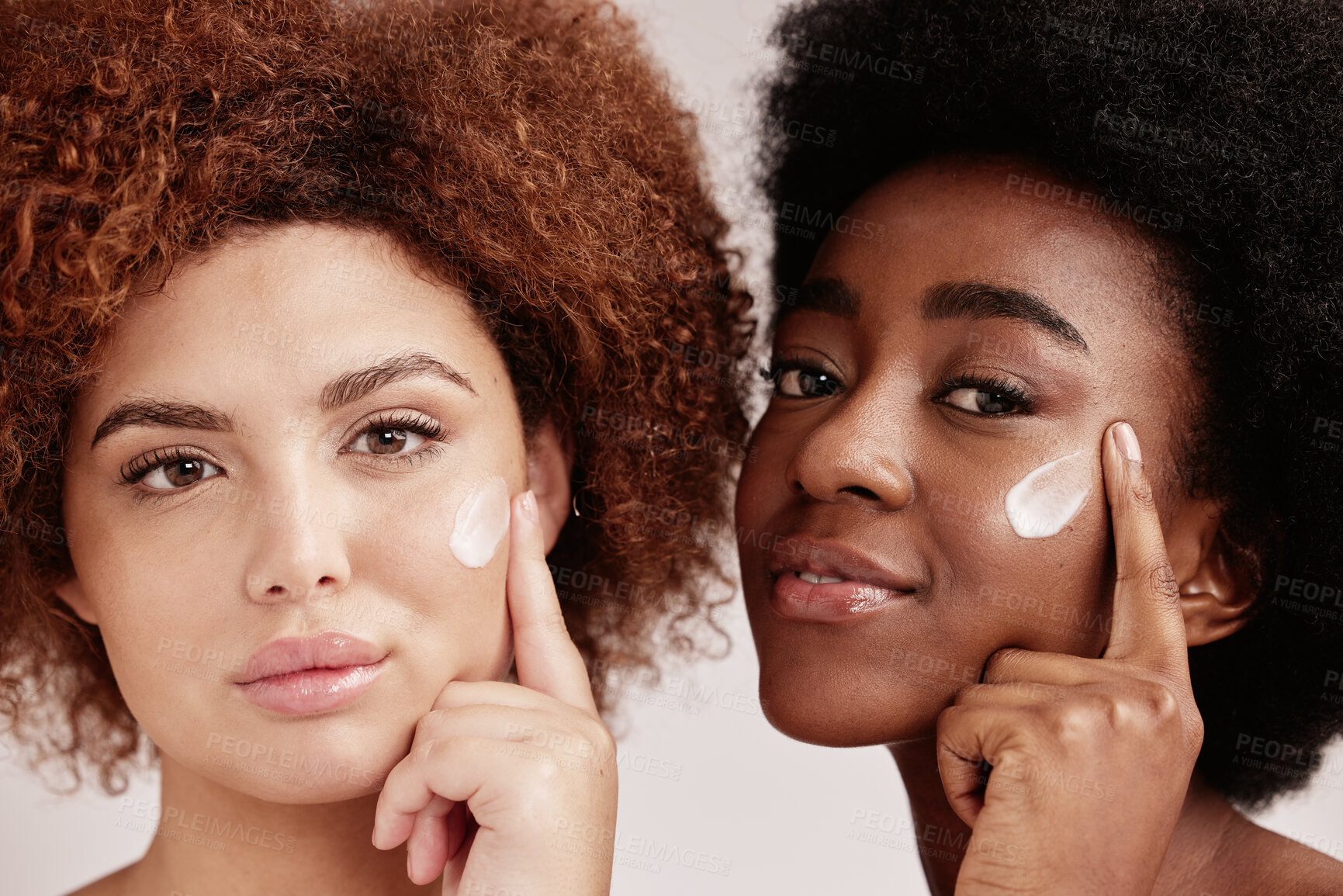 Buy stock photo Skincare, face cream and portrait of women in a studio for a wellness, health and natural routine. Beauty, cosmetic and interracial females with facial moisturizer, spf or lotion by nude background.