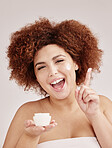 Skincare, portrait of woman with cream on finger, smile and afro, advertising luxury skin product. Dermatology, cosmetic and facial beauty for happy model isolated on studio background, lotion in jar