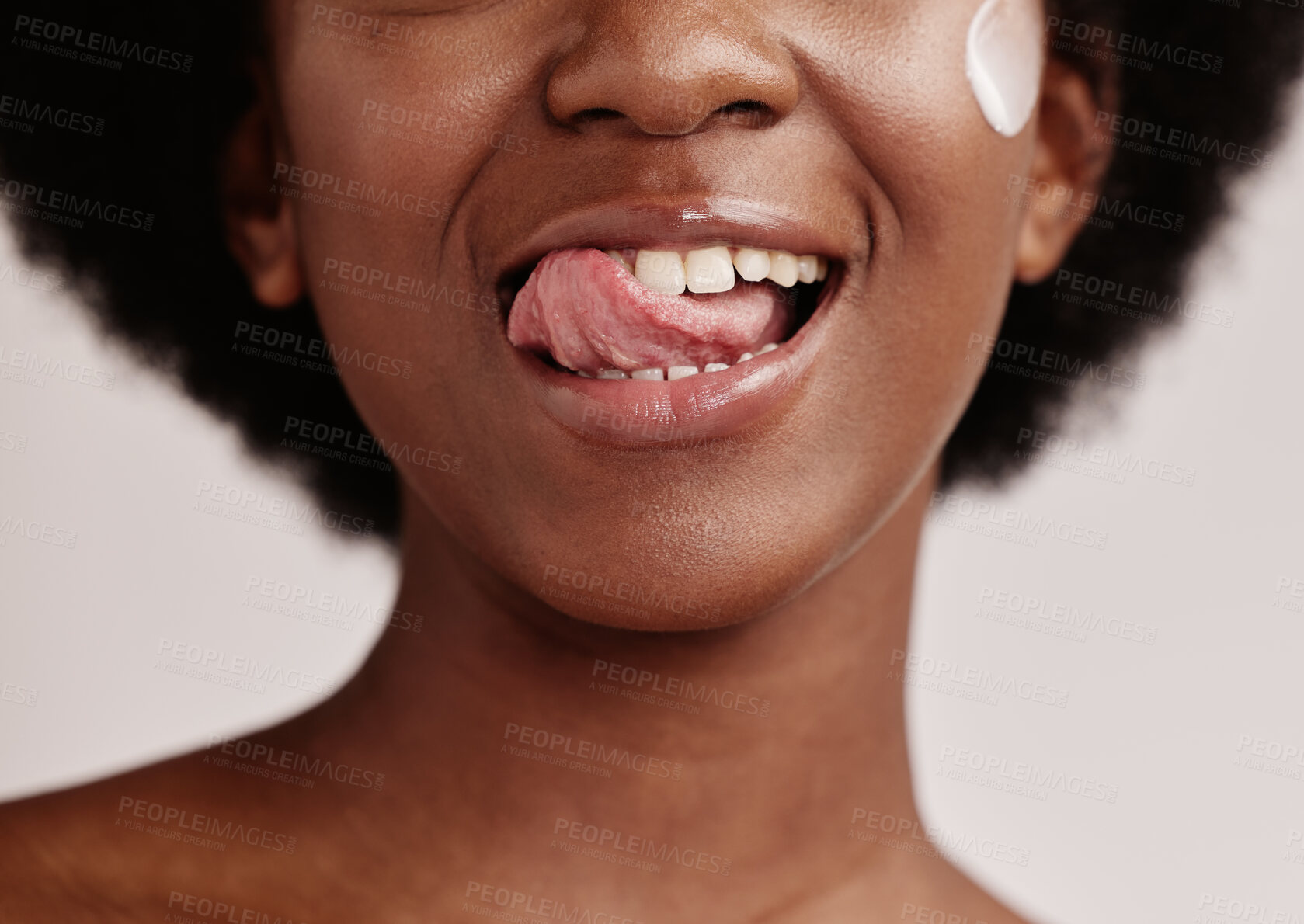 Buy stock photo Beauty, face or tongue over teeth in dental care, mouth hygiene or oral wellness in healthcare grooming. Zoom, black woman or model licking lips in skincare product glow, clean orthodontics or makeup