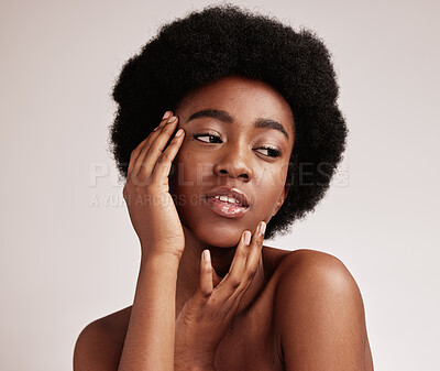 Buy stock photo Black woman, skincare and beauty of a model thinking with skin glow from dermatology. Facial, self care and wellness of an African female in a isolated white background in a studio with cosmetics