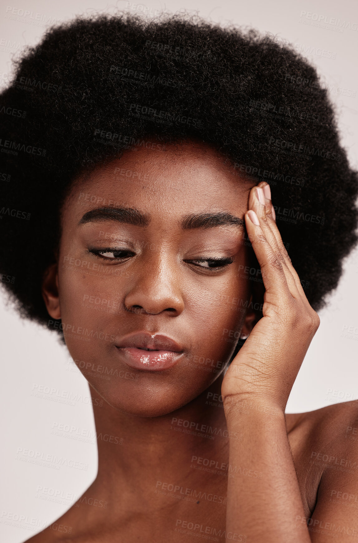 Buy stock photo Black woman, skincare and beauty secret of a model with skin glow from dermatology. Facial, self care and wellness of an African female in a isolated white background in a studio with cosmetics