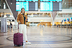 Woman, airport and luggage for travel, vacation or journey in schedule flight with passport in Cape Town. Portrait of happy female traveler standing ready for departure, boarding plane or immigration