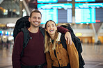 Couple, love and travel portrait at airport lobby for holiday, vacation or global traveling. Luggage, valentines day and happy man and woman laughing at funny joke, hug or waiting for flight together