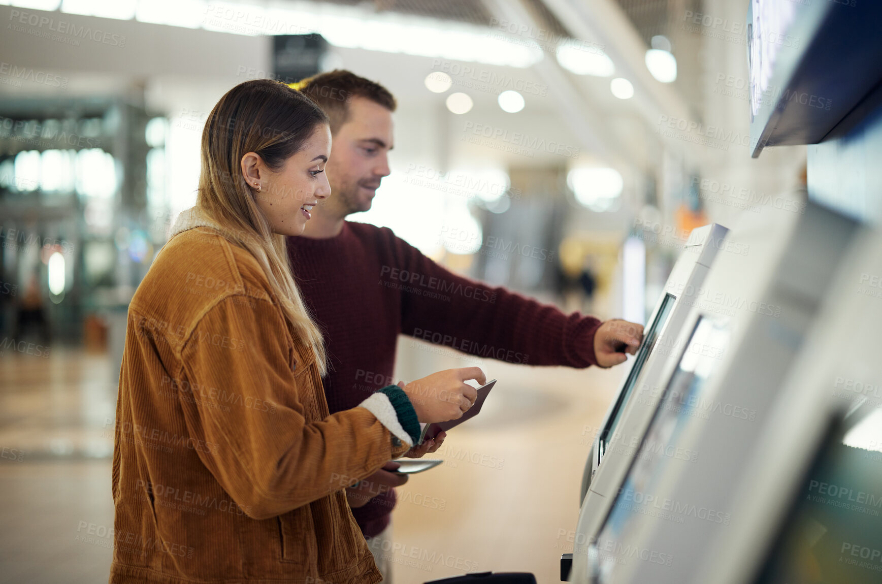 Buy stock photo Travel, airport and couple at check in machine with passport and ticket for flight. Valentines day, immigration or happy man and woman by airline lobby or kiosk for boarding pass for holiday vacation