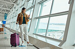 Luggage, travel and woman with phone at airport for social media, web scrolling or internet browsing. Suitcase, mobile and happy female on smartphone for networking while waiting for flight departure