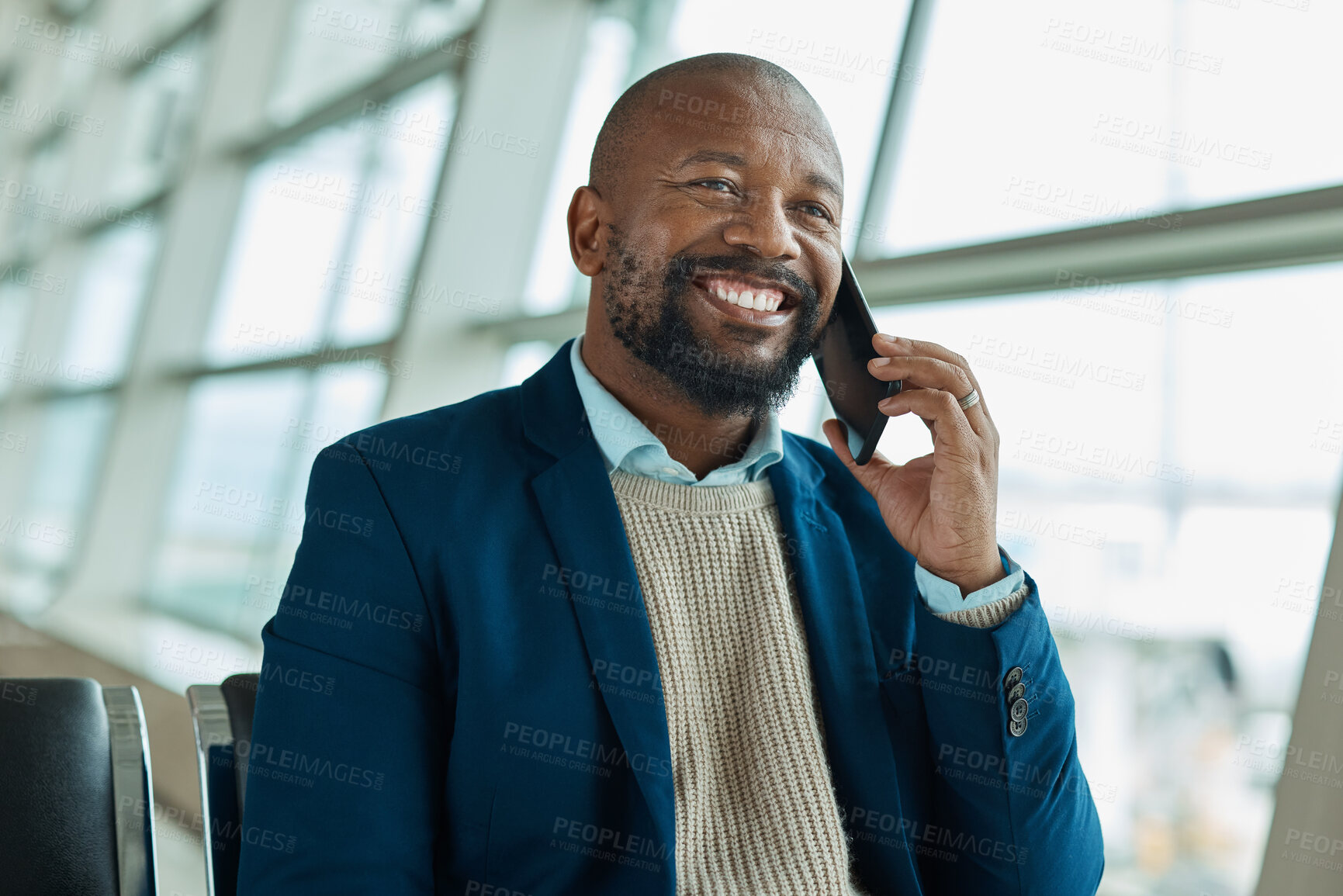 Buy stock photo Black man, phone call and smile at airport for business travel, trip or communication waiting for plane. African American male smiling for conversation, traveling or flight schedule on smartphone