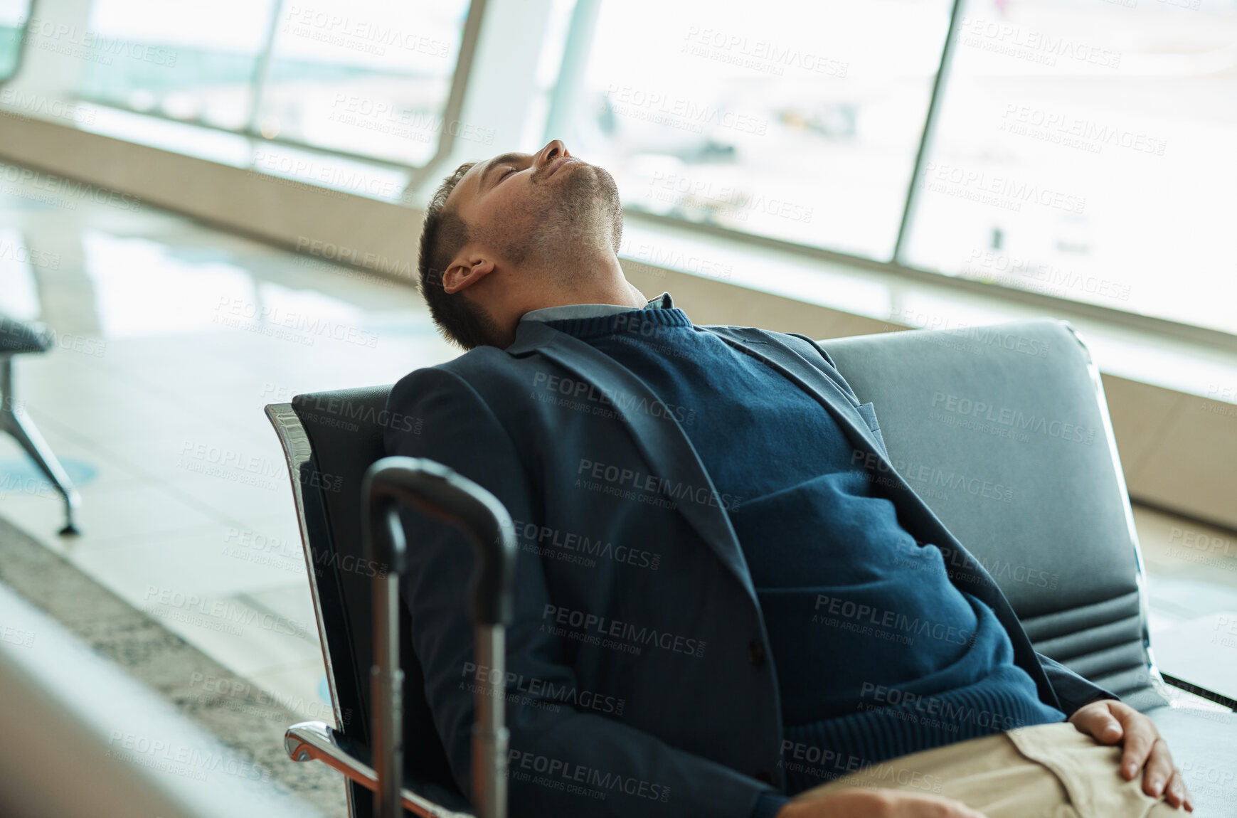 Buy stock photo Airport, travel and tired businessman sleeping while waiting to board his plane for work in city. Exhausted, rest and professional corporate male employee taking nap while traveling with flight delay