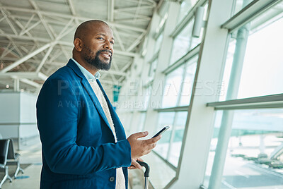 Buy stock photo Black man, phone and thinking at airport window for business travel, trip or communication waiting for flight. African American male with smile contemplating schedule or plain times on smartphone