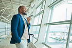 Black man, phone call and luggage at airport for business trip, travel or communication waiting for flight. African American male smile for conversation on smartphone and looking out window for plain
