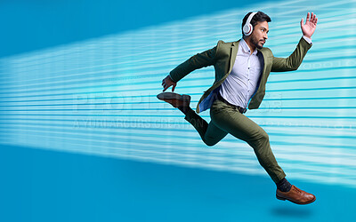 Buy stock photo Business, man in suit and running for appointment, goal driven and headphones for streaming music, motivation or entrepreneur. Male manager, leader or employee with headset, fast or target for growth