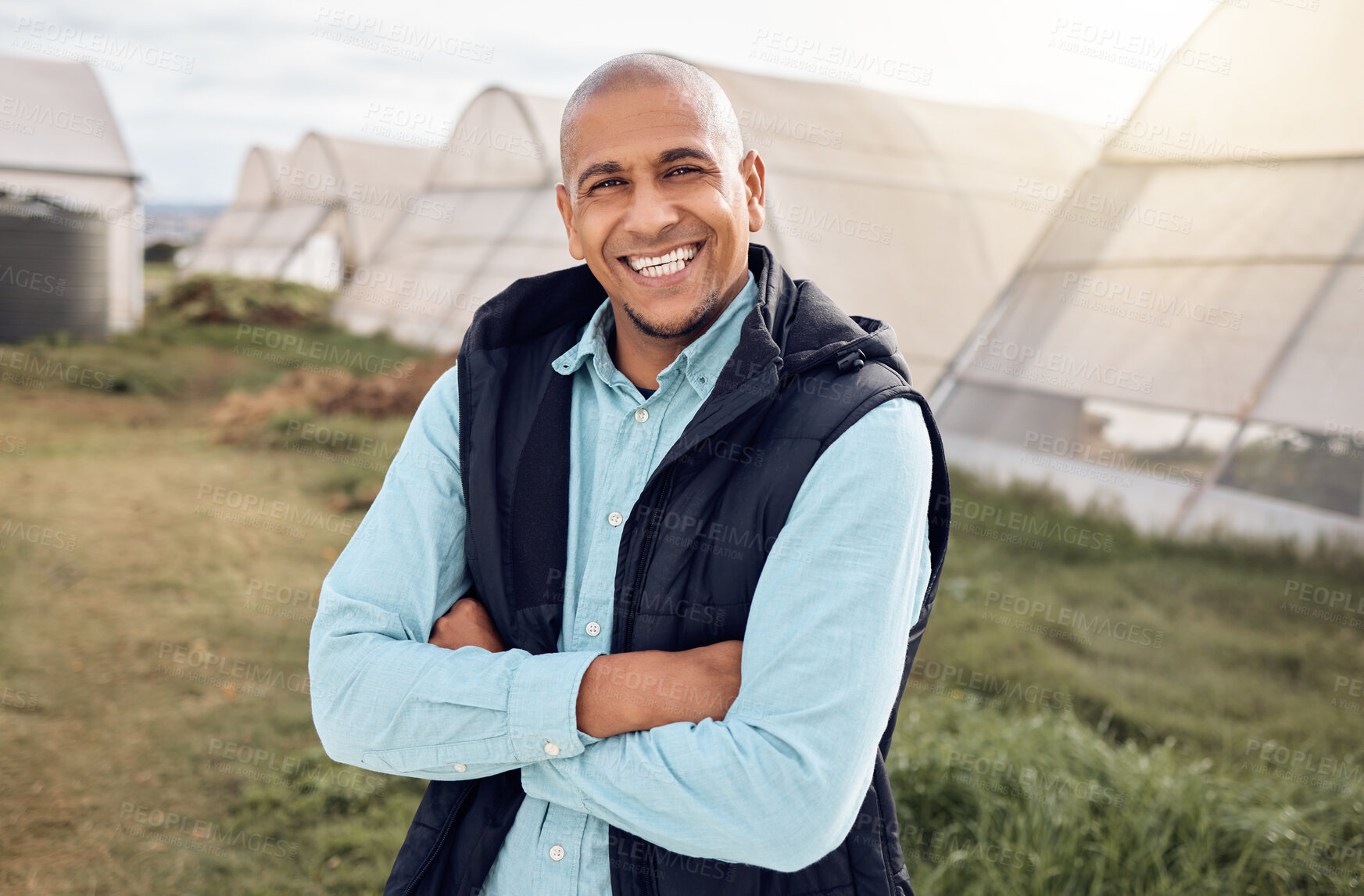 Buy stock photo Black man, farmer and outdoor portrait with arms crossed, smile and happiness for sustainable farm. Farming expert, sustainability and happy in field by greenhouse with goals, vision and motivation