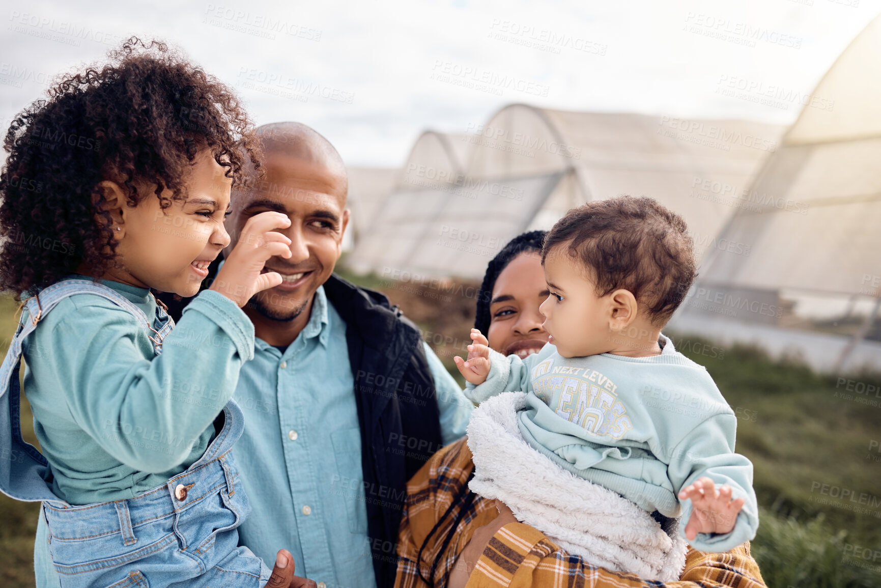 Buy stock photo Family, agriculture and parents with children in field for bonding, relax and love in countryside. Sustainability, farming and happy mom, dad and kids together on farm for gardening, nature and calm