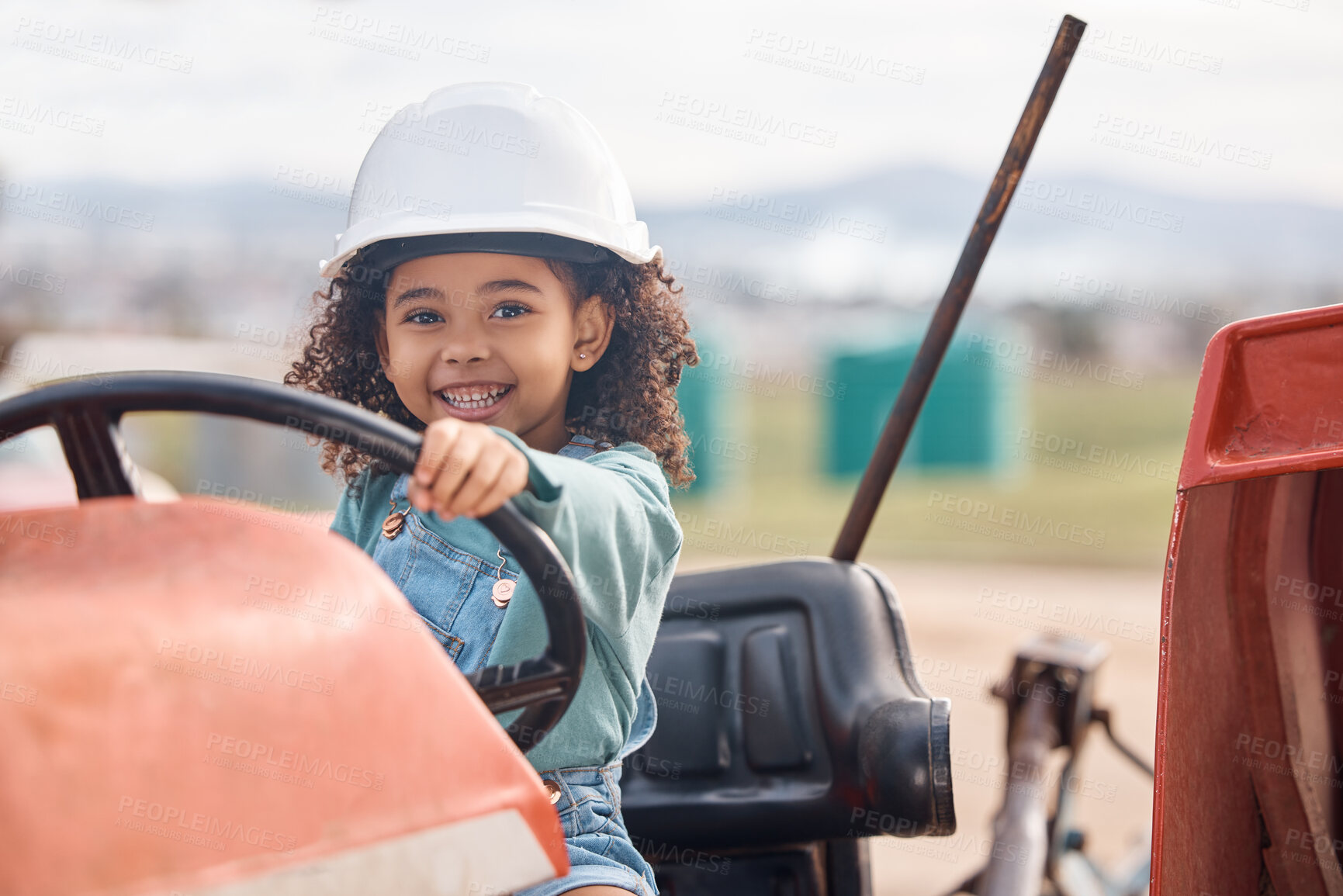 Buy stock photo Girl child in tractor, portrait and farming transport, sustainability and learning field work with development and fun. Childhood, farm machinery and farmer in training, growth and kid in agriculture