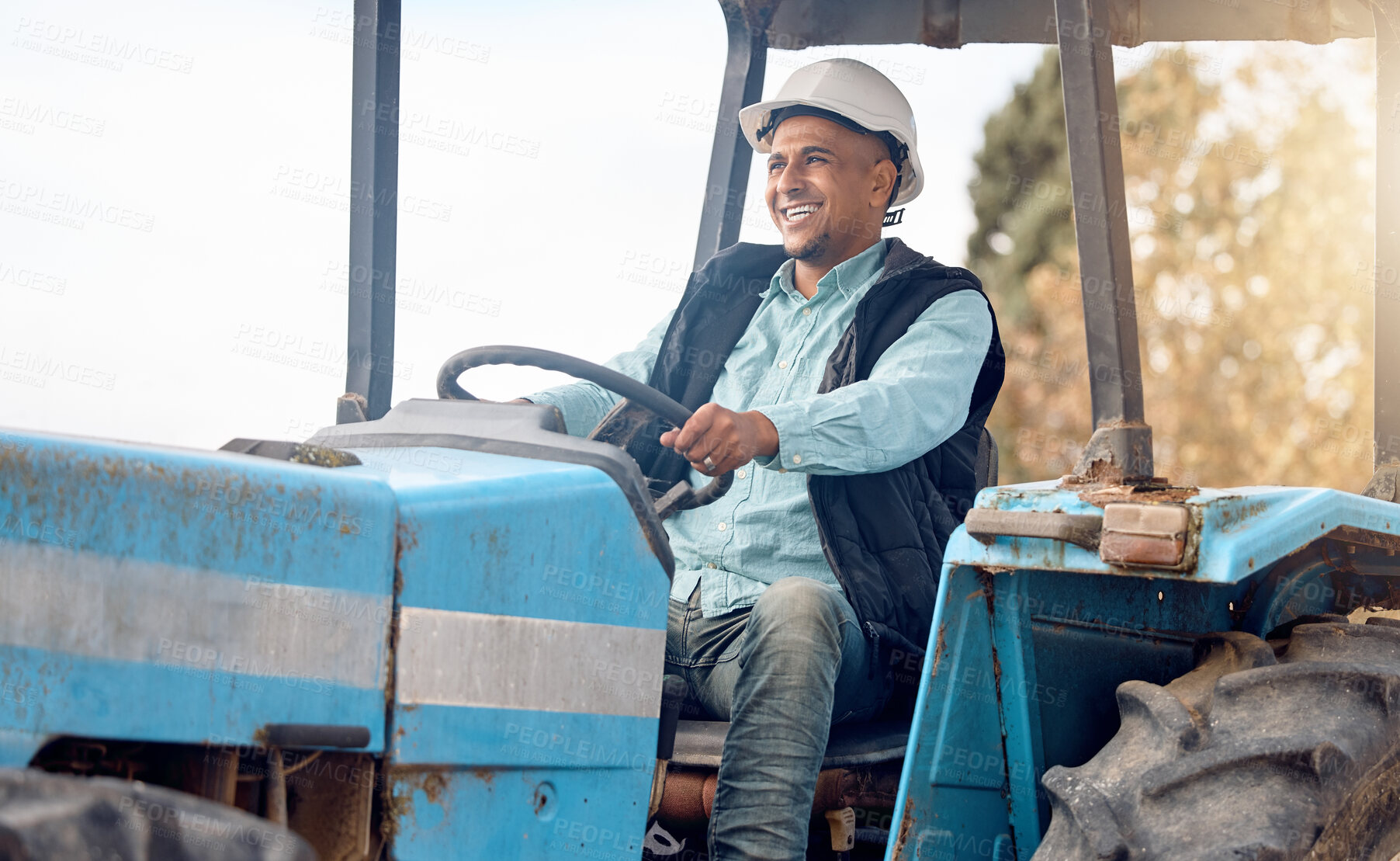 Buy stock photo Tractor, man and farmer on field for agriculture, countryside or sustainability in nature. Happy farming worker driving machine truck, transport and sustainable ecology with happiness of land harvest