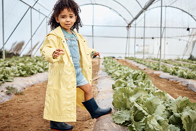 Buy stock photo Kid, talking or girl in farming portrait, greenhouse or agriculture land education in sustainability field growth. Child, learning or gardening boots in countryside nature with lettuce agro questions