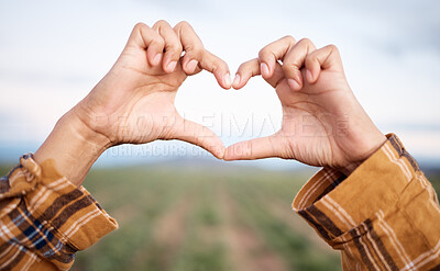 Buy stock photo Heart hands, agriculture and farming and countryside for sustainability, farming or agro business people in industry. Love emoji sign, farmer couple and plants growth on field sustainable development
