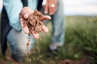 Buy stock photo Farmer, hands or checking soil in farming field, agriculture land or countryside sustainability in vegetables growth success. Zoom, black man or gardening worker holding fertilizer, mud or earth dirt