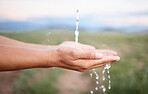 Hands, water and washing or cleaning for hygiene, hydration and washing with a splash outdoors on a farm. Person, nature and aqua to prevent germs or bacteria for care, wellness and health