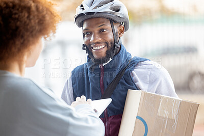 Buy stock photo Black man, box and smile for delivery service, package or female customer order in city. Happy African American male courier employee smiling or delivering cargo to woman with clipboard for signature