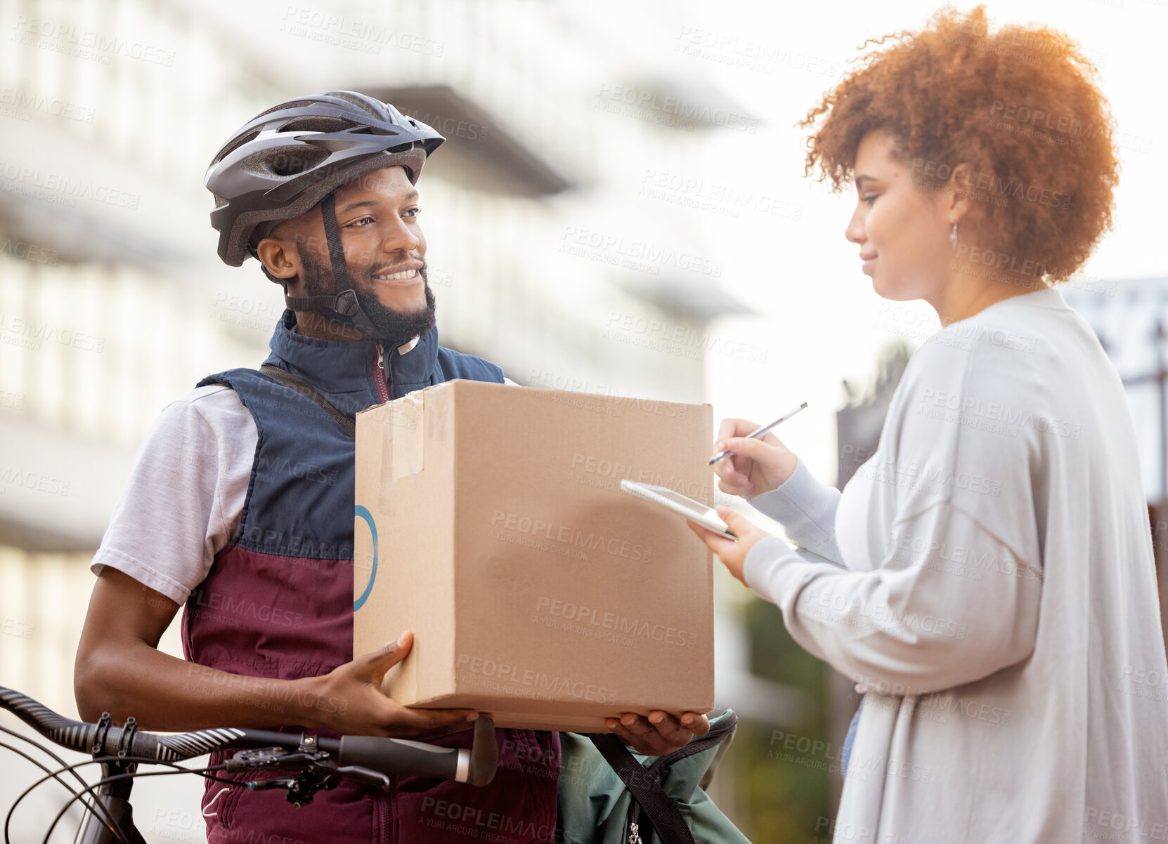 Buy stock photo Black man, box and tablet in delivery service, package or parcel for female customer order in city. Happy African American male courier employee delivering cargo to woman with touchscreen signature