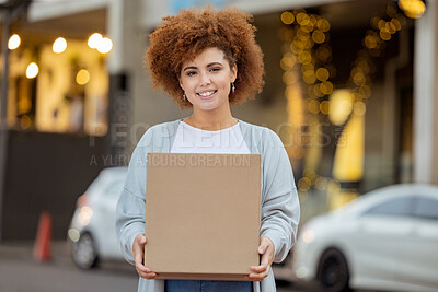 Buy stock photo Moving box, black woman and happiness outdoor by new home apartment building with a smile. Real estate, investment and young person holding boxes feeling happy about mortgage and property sale