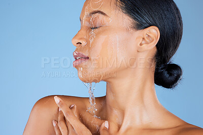 Buy stock photo Model, water splash or washing face in shower grooming, healthcare or sustainability cleaning on isolated blue background. Zoom, black woman or beauty in wet drops for skincare hydration dermatology