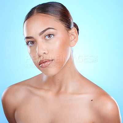 Buy stock photo Portrait, beauty and blue background with a model black woman in studio for skincare or wellness. Face, skin and makeup with an attractive young female posing for natural treatment or cosmetics