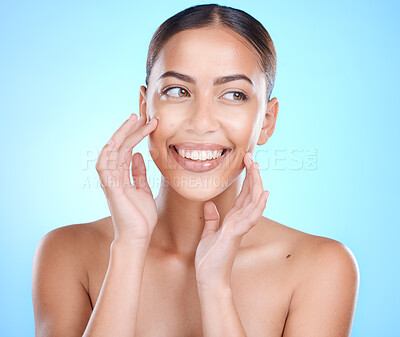 Buy stock photo Makeup, happy and woman with hands on face in studio for skincare, wellness or gentle cleaning on blue background. Face, beauty and girl skin model relax in luxury, cosmetic and facial while isolated