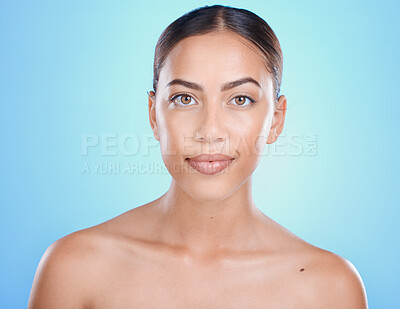 Buy stock photo Portrait, beauty and skin with a model black woman in studio on a blue background for skincare. Face, skincare and makeup with an attractive young female posing for natural treatment or cosmetics