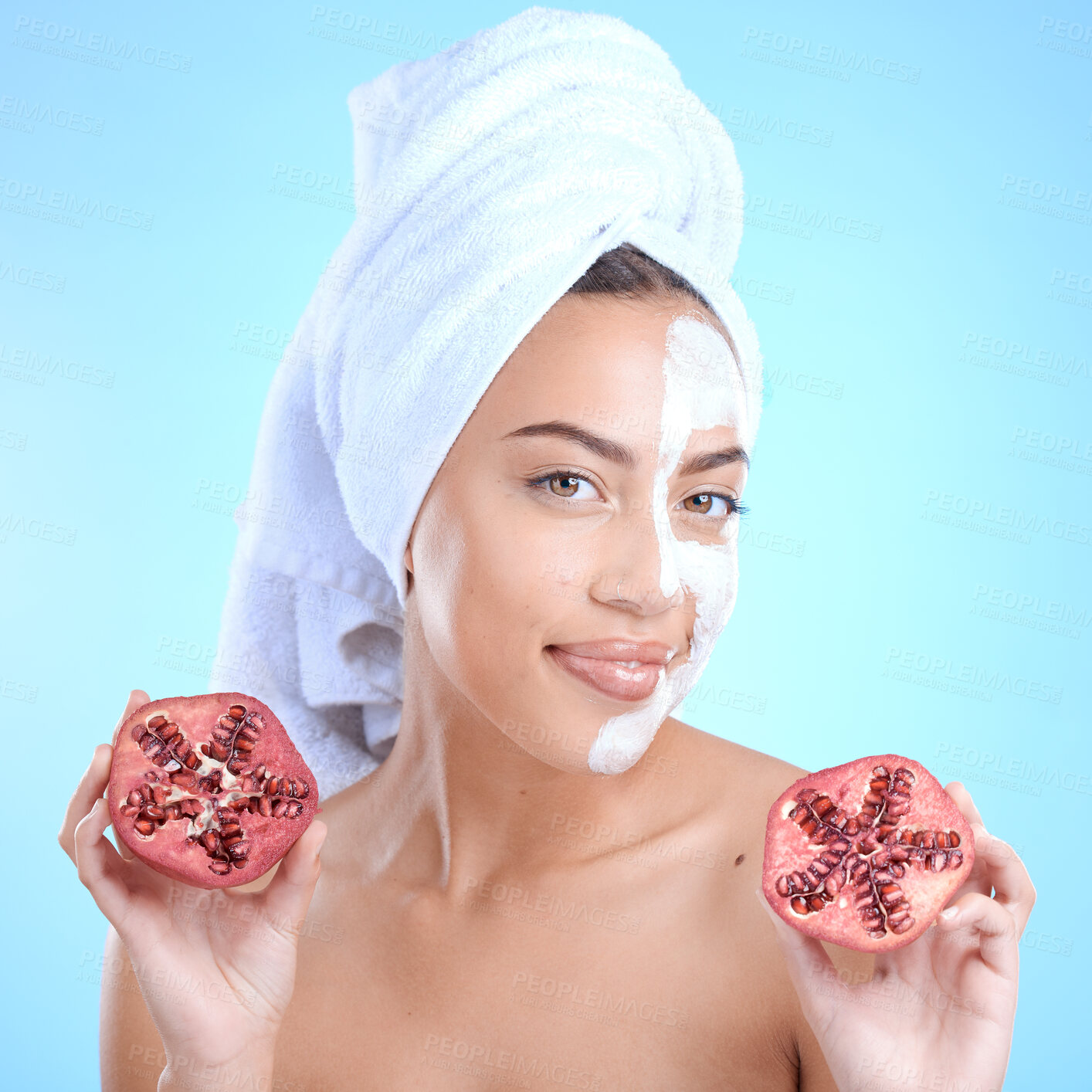Buy stock photo Beauty, pomegranate and face mask portrait of woman natural dermatology skincare cosmetics. Aesthetic model person with sustainable fruit product for self care, skin glow and facial blue background