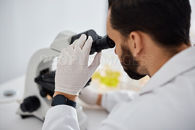 Buy stock photo Microscope, medical and research with a man at work in a laboratory for science, innovation or development. Doctor, analytics and biotechnology with a male scientist working in a lab for breakthrough