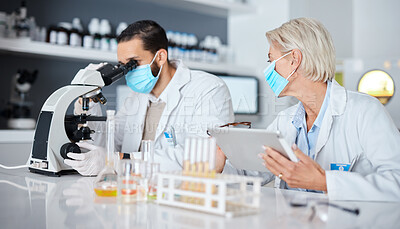Buy stock photo Scientist teamwork, lab and tablet covid 19 vaccine research for company with mask, studying and pharma. Man, woman and science with microscope analysis, tech and medical goals for healthcare future