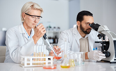 Buy stock photo Science, collaboration and research with a medicine team working in a laboratory for innovation or development. Doctor, teamwork or medical with a man and woman scientist at work in a pathology lab