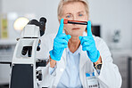 Senior woman, doctor and hands with blood test, vial or sample for scientific research, testing or exam in a lab. Elderly female scientist or medical expert holding DNA for science test at laboratory