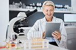 Science, tablet and research woman with microscope data analytics, test results and laboratory software management. Biotechnology, medicine and digital healthcare expert, scientist or senior person