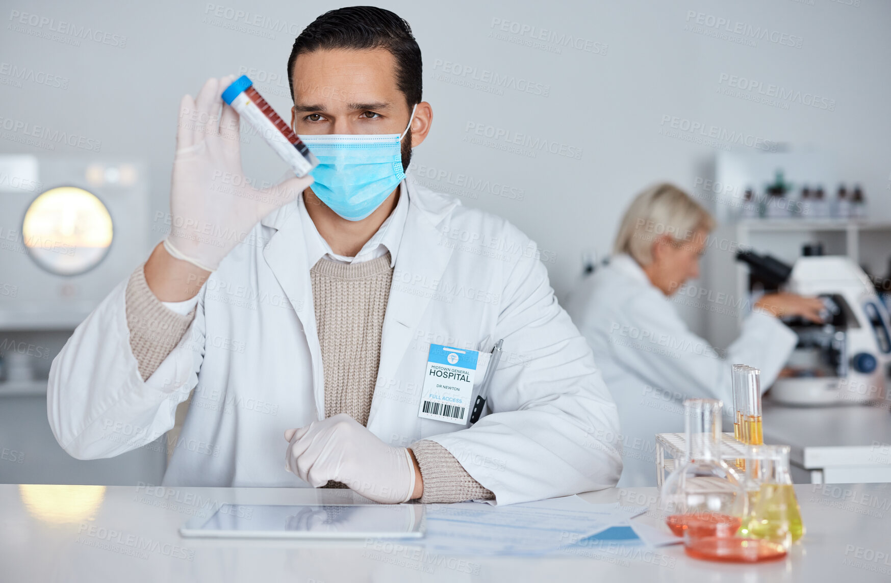 Buy stock photo Science, mask and man with blood, laboratory and experiment for cure, diagnosis and dna information. Face cover, male scientist and research with vial, check liquid and test tube for results in lab