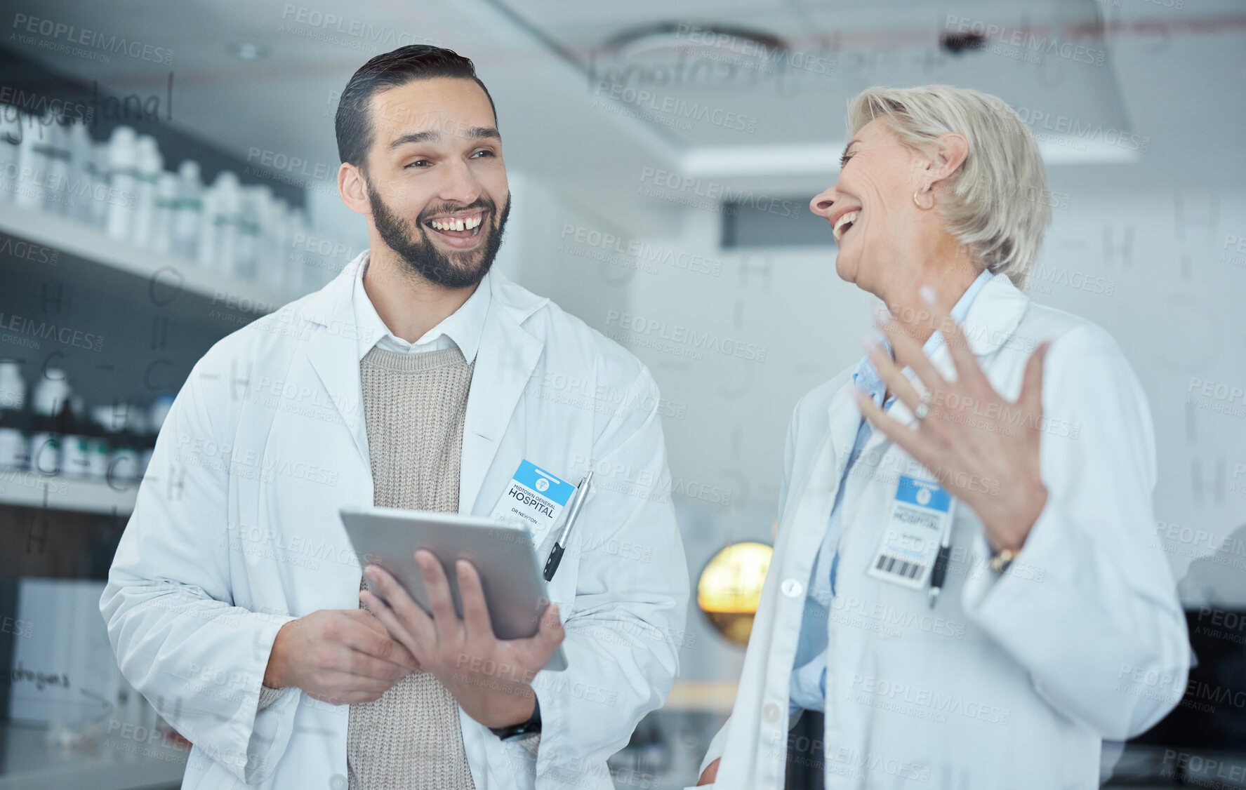 Buy stock photo Science, tablet and scientists talking in a lab working on scientific research, experiment or test. Happy, funny and professional researchers laughing in discussion with mobile device in a laboratory