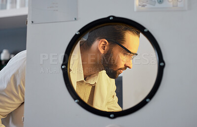 Buy stock photo Scientist, man with incubator and science experiment with medical research, biotechnology or ivf with innovation. Scientific study in laboratory, test sample storage and doctor face with researcher