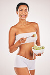 Salad, portrait and body of woman isolated on a white background for diet, lose weight and healthy food promotion. Green vegetables, fitness and model person in underwear for detox results in studio