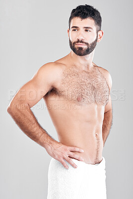Buy stock photo Health, skincare and grooming, man with towel after shower or bathroom routine with muscular body care in studio. Spa, wellness and cleaning skin treatment for male model isolated on grey background.