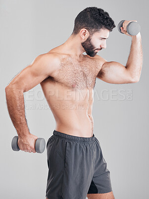 Buy stock photo Bodybuilder man, studio and dumbbells for training, fitness and muscle development by gray background. Model, healthy strong body and exercise for wellness, growth and goals for motivation at workout
