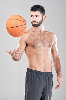 Fitness, sport and man throwing ball in air, topless basketball player isolated on grey background. Exercise, motivation and training, sports coach or personal trainer with workout mindset in studio.