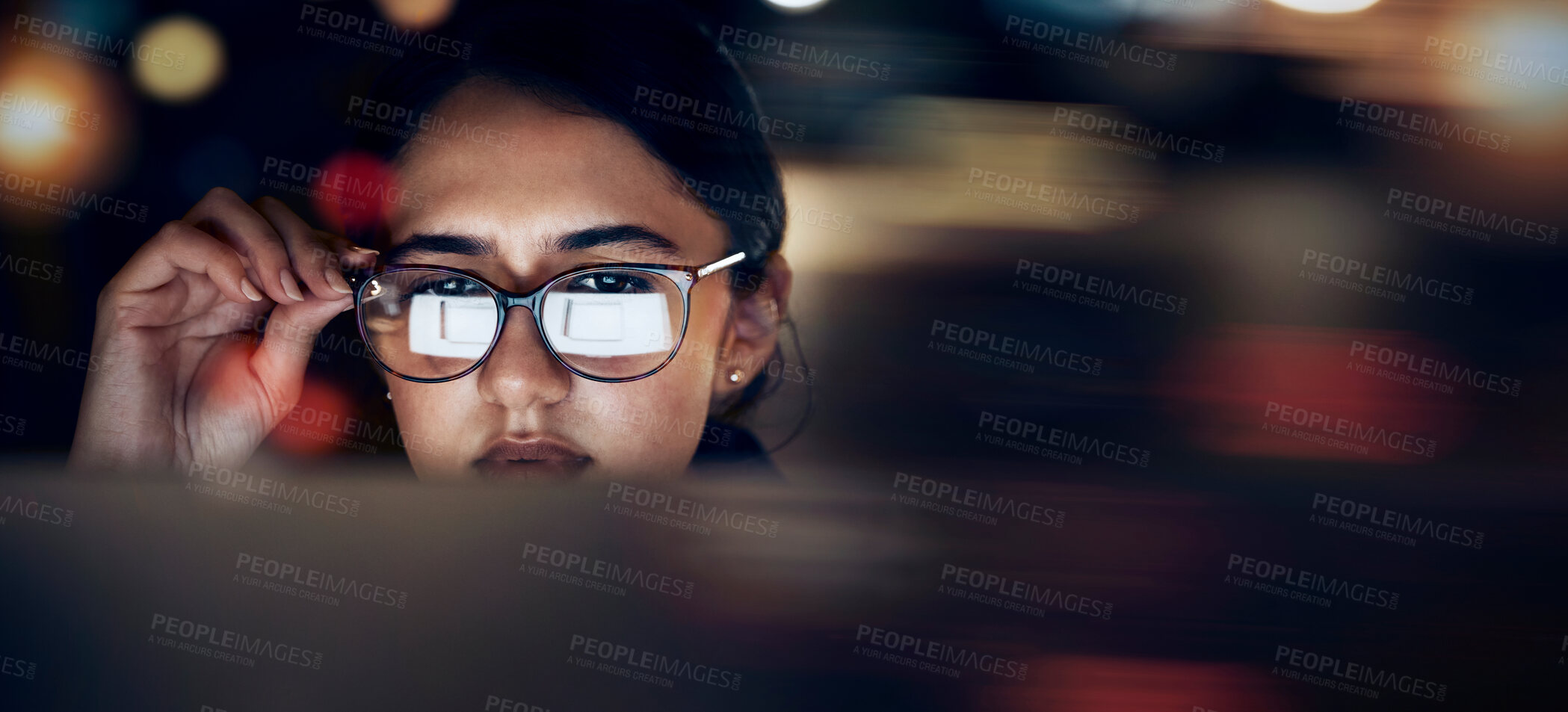 Buy stock photo Woman, glasses reflection and computer at night for planning, website search and technology. Face of female working late on desktop, dark office and reading online network, focus vision and internet 