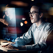 Programming, coding and website with man at computer for software ...